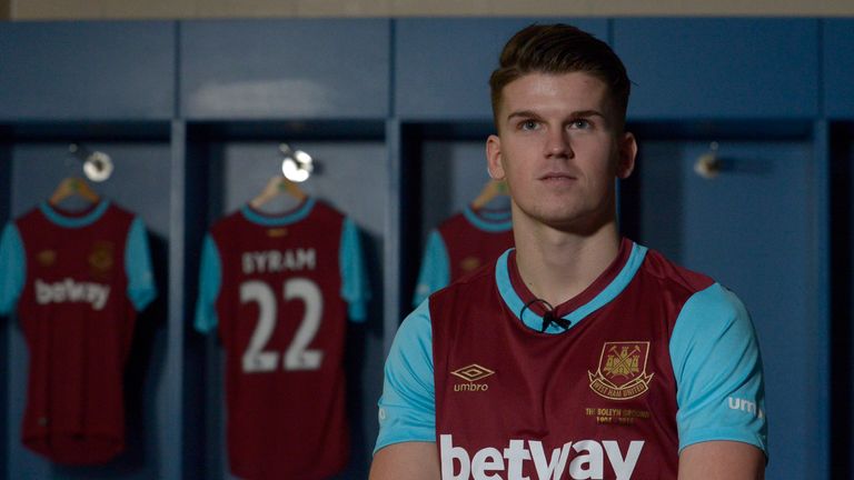 Sam Byram poses for the cameras after sealing a £3.7m move to West Ham from Leeds