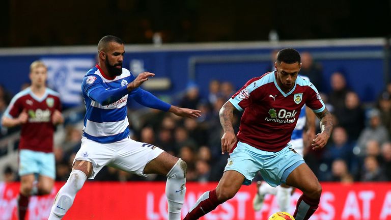 Sandro (L) shadows Andre Gray during QPR's Championship game against Burnley in December