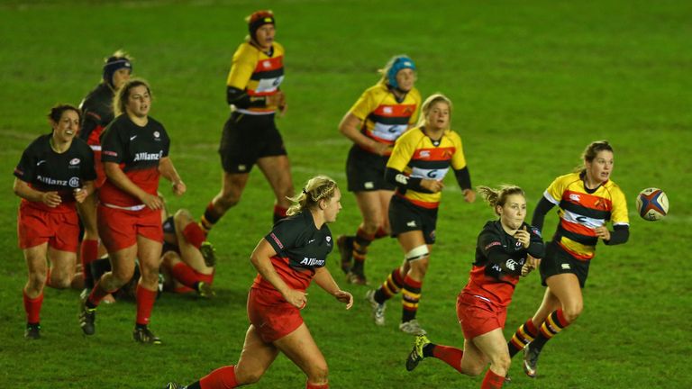 April Brown passes the ball as the Richmond defence shifts