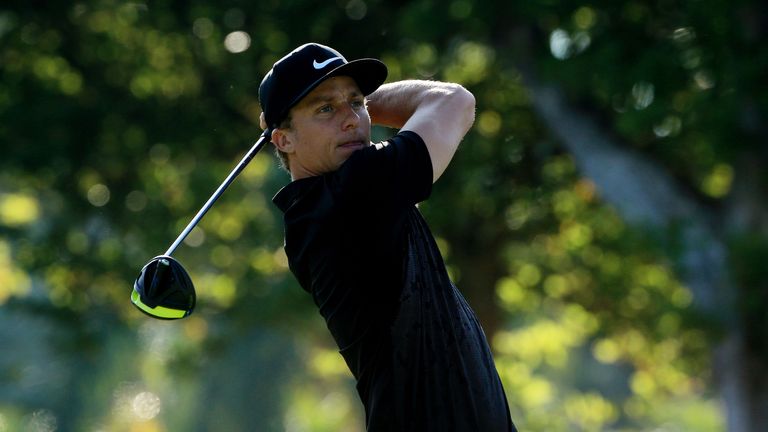 Scott Pinckney plays his shot from the first tee during the first round of the Sony Open In Hawaii at Waialae Country Club on J