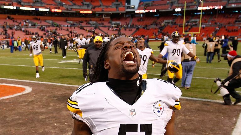 Sean Spence celebrates after the Steelers won to clinch a playoff spot