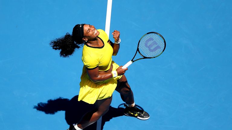  Serena Williams celebrates winning a point in her first round match against Camila Giorgi at the Australian Open