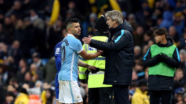 Manchester City's Sergio Aguero and manager Manuel Pellegrini after the Capital One Cup, semi final, second leg at the Etihad Stadium, Manchester.