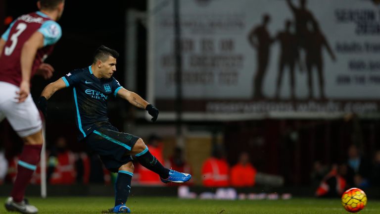 Manchester City's Argentinian striker Sergio Aguero scores
