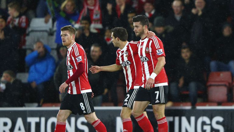 Shane Long (right) celebrates scoring Southampton's first goal against Watford