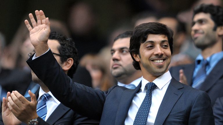 Manchester city owner Sheikh Mansour bin Zayed Al Nahyan (C) looks on during the English Premier League football match against Liverpool at The City of Man
