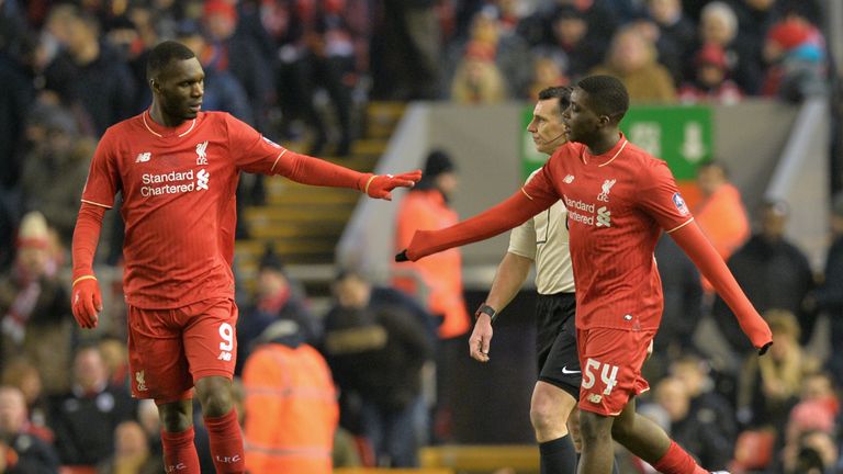 Sheyi Ojo (R) celebrates with Christian Benteke after scoring his first goal for Liverpool