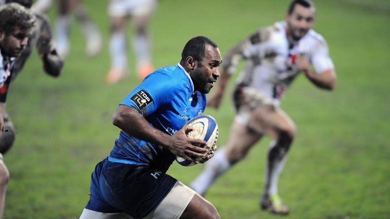 Castres centre Sitiveni Sivivatu runs with the ball during the Top 14 rugby match Castres vs Toulouse
