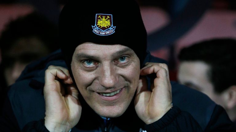 Slaven Bilic puts on a hat before the Premier League match between Bournemouth and West Ham United