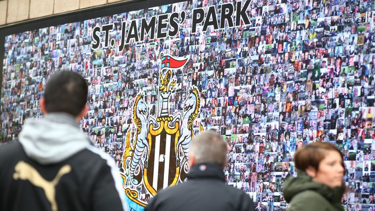 Supporters make their way to the stadium prior to the Barclays Premier League match between Newcastle United and West Ham United at St. James' Park 