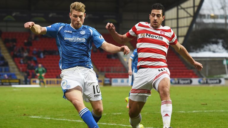 St Johnstone's David Wotherspoon (left) takes on Hamilton's Lucas Tagliapietra 