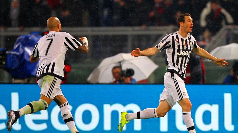 Stephan Lichtsteiner (right) celebrates after putting Juventus in front in the second half