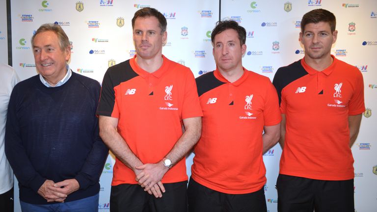 Liverpool Legends Steven Gerrard (R) Jamie Carragher (2nd L) and Robbie Fowler (2nd R) stand with former manager Gerard Houllier (R)