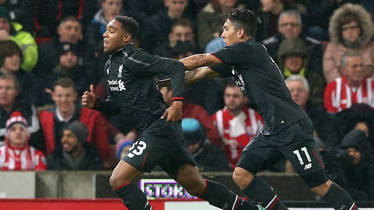 Liverpool's Jordon Ibe (left) celebrates with Roberto Firmino after scoring against Stoke