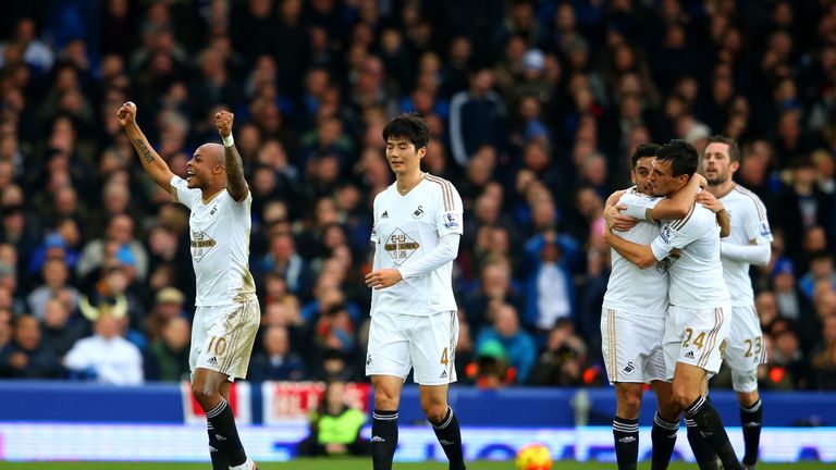 Andre Ayew celebrates after putting Swansea back in front against Everton