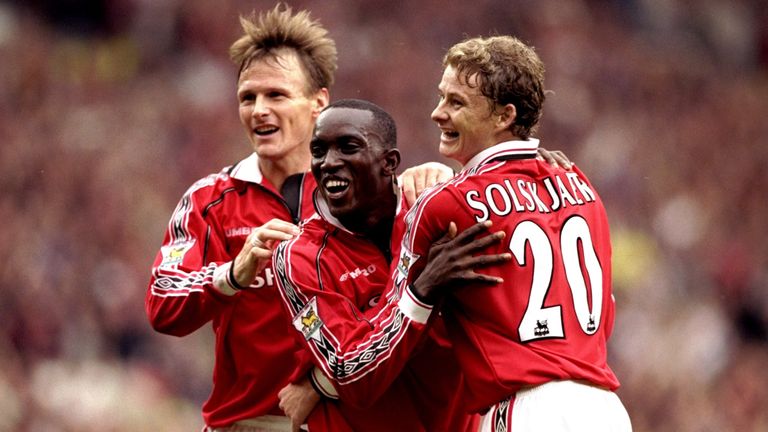 25 Sep 1999:  Teddy Sheringham, Dwight Yorke and Ole Gunnar Solskjaer of Manchester United celebrates during the FA Carling Premiership match played at Old