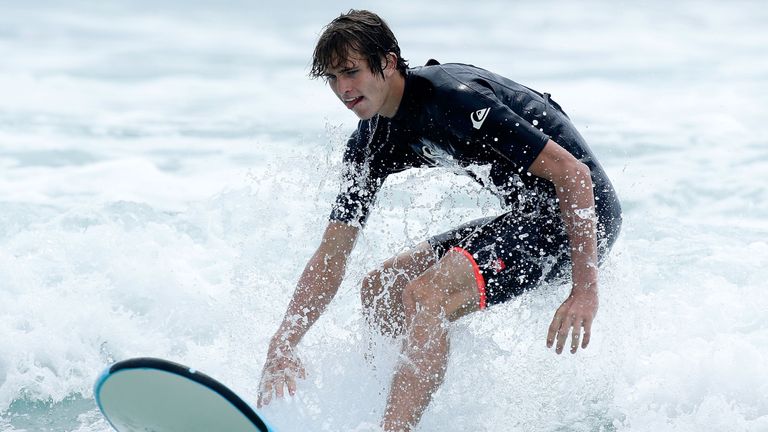 Alexander Zverev of Germany has a surfing lesson at Trigg beach