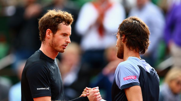 Andy Murray shakes hands at the net after victory over Joao Sousa at the French Open