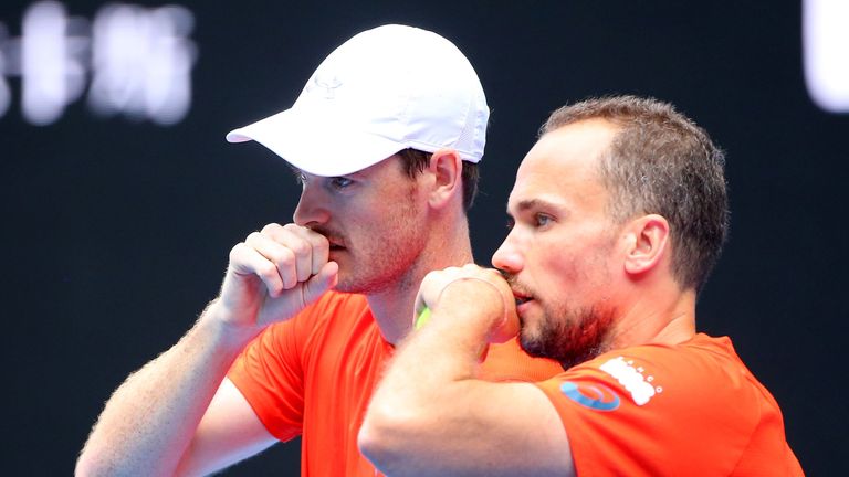 Jamie Murray and Bruno Soares talk tactics in their doubles semi-final against Adrian Mannarino and Lucas Pouille