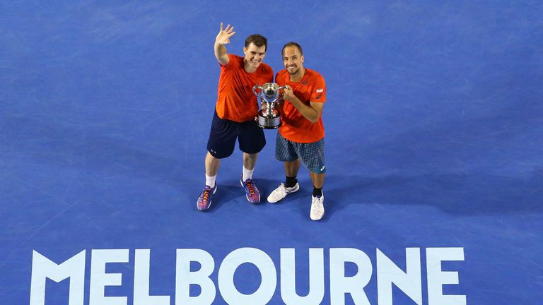 Bruno Soares and Jamie Murray pose with the Australian Open trophy