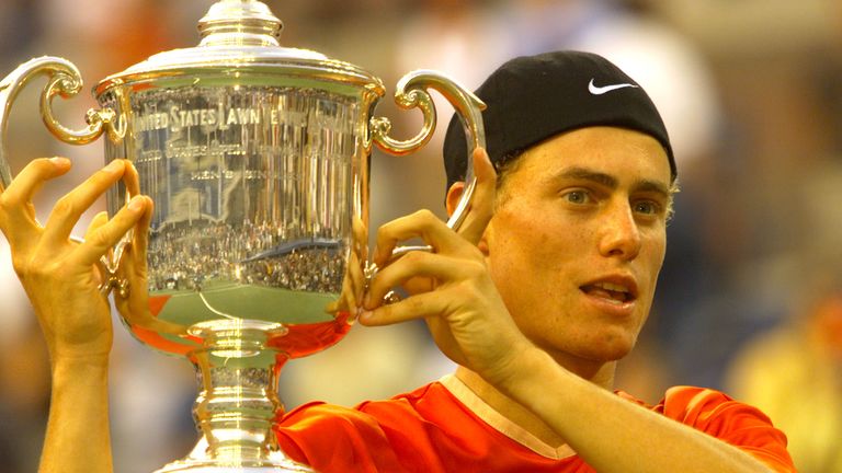 Lleyton Hewitt holds the trophy after defeating Pete Sampras in the 2001 US Open final