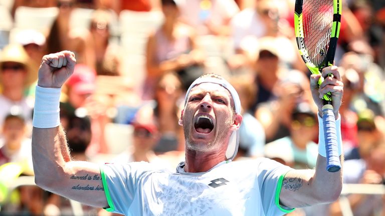 Sam Groth celebrates winning his first round match against Adrian Mannarino at the Australian Open