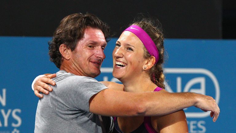 Victoria Azarenka of Belarus celebrates with her coach Sam Sumyk
