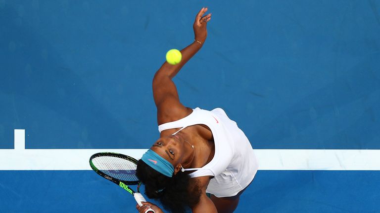 Serena Williams of the United States serves in her singles match against Jarmila Wolfe of Australia Gold