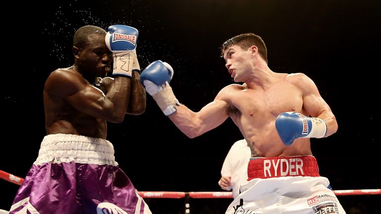 John Ryder (right) in action with Theophilus Tetteh