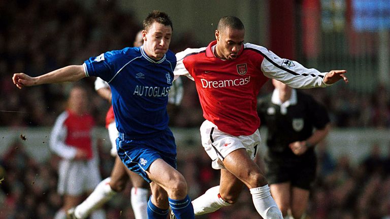 18 Feb 2001:  John Terry of Chelsea holds off the challenge of Thierry Henry of Arsenal 