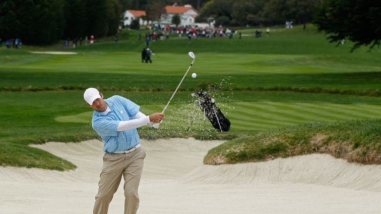 PEBBLE BEACH, CA - FEBRUARY 12:  Tony Romo, NFL football quarterback for the Dallas Cowboys, hits from a bunker on the second hole during the final round o