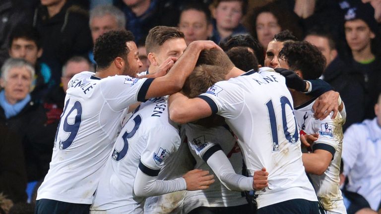 Tottenham Hotspur players celebrate after Dele Alli scored their second goal