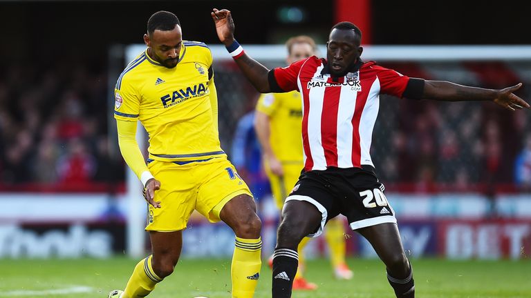 BRENTFORD, ENGLAND - NOVEMBER 21:  Toumani Diagouraga of Brentford and Liam Trotter of Nottingham Forest during the Sky Bet Championship match between Bren