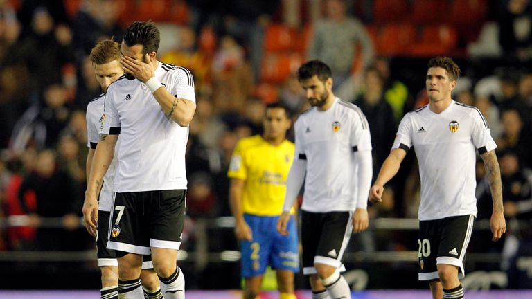 Valencia's forward Alvaro Negredo (2nd R) gestures