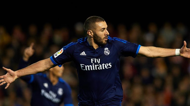 Karim Benzema celebrates the opening goal