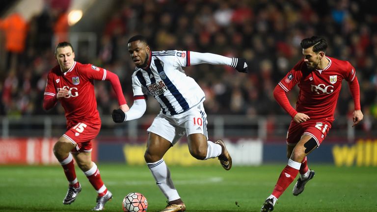 Victor Anichebe (C) of West Brom Albion competes for the ball against Marlon Pack (R) and Luke Freeman (L) of Bristol City