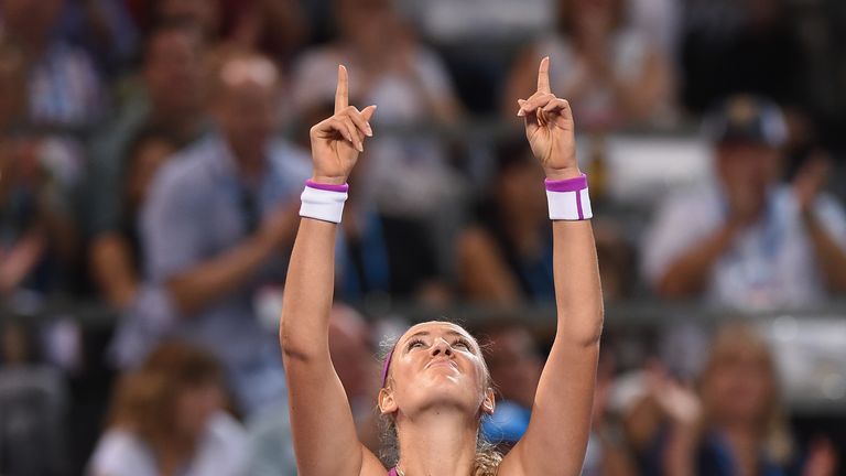 Victoria Azarenka of Belarus celebrates after beating Angelique Kerber in the Brisbane International final