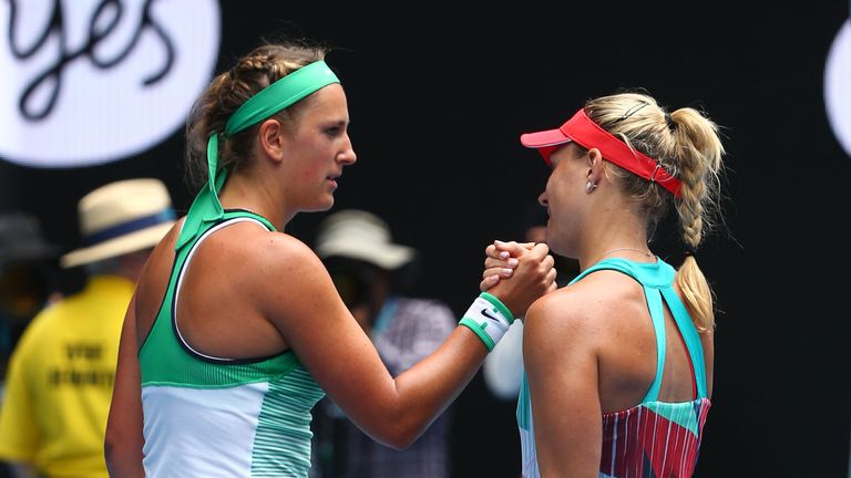 Victoria Azarenka of Belarus congratulates Angelique Kerber of Germany on winning their quarter final match during day 10 of the 2016 Australian Open