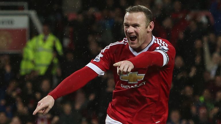 Wayne Rooney celebrates after making it 2-1 against Swansea