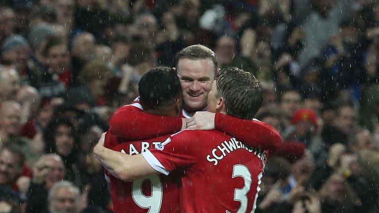 Wayne Rooney celebrates his goal against Swansea in Manchester United's 2-1 win 