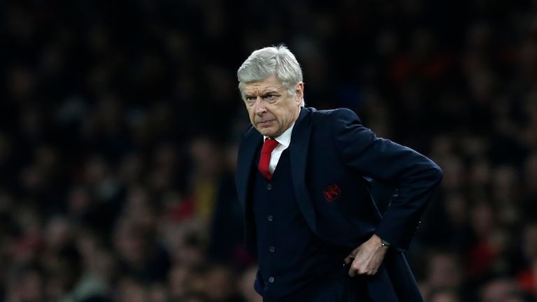 Arsenal's French manager Arsene Wenger looks on from the touchline
