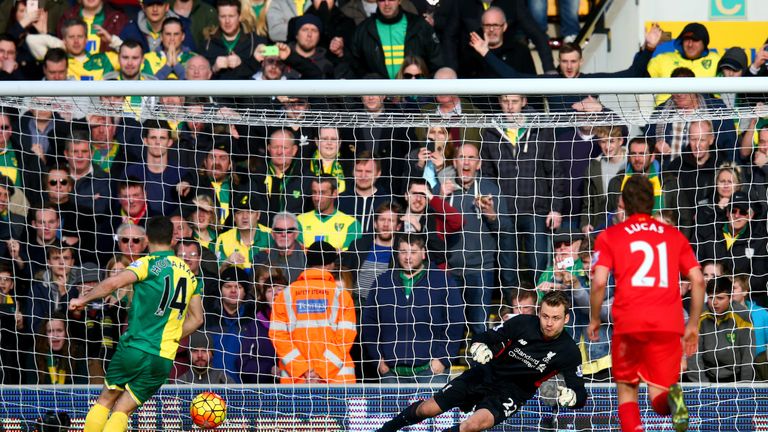 Wes Hoolahan (left) puts Norwich 3-1 up from the penalty spot in the 54th minute