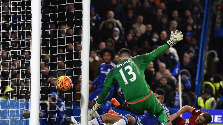 West Brom's Gareth McAuley (right) bundles the ball into his own net past Boaz Myhill 