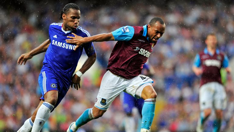 West Ham's Welsh defender Daniel Gabbidon (R) vies with Chelsea's Ivorian striker Didier Drogba (L)