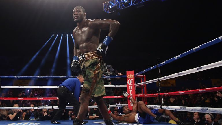 Deontay Wilder walks back to his corner after knocking out Kelvin Price during their Vacant WBC Continental Americas Heavyw