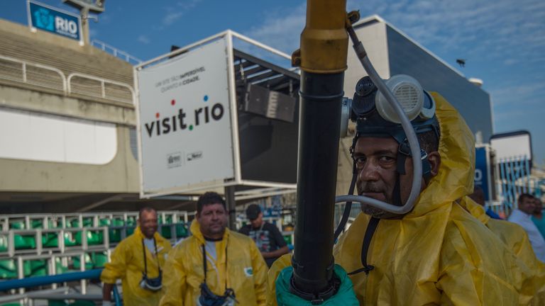 Municipal agents spray anti Zika mosquitos in Rio