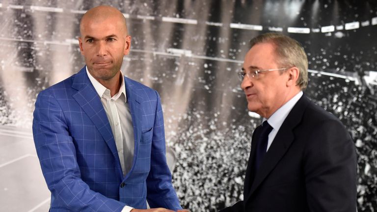 Real Madrid's new French coach Zinedine Zidane (left) is congratulated by Real Madrid's president Florentino Perez 