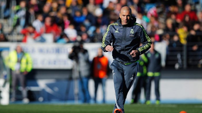 Newly appointed manager of Real Madrid, Zinedine Zidane, passes the ball during a Real Madrid training session