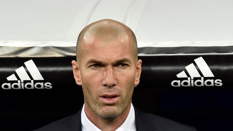 Real Madrid's new French coach Zinedine Zidane looks on before the Spanish league football match Real Madrid CF 
