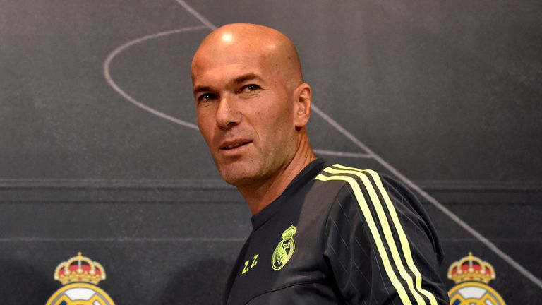 Real Madrid's new French coach Zinedine Zidane arrives to give a press conference at the Valdebebas training ground in Madrid on January 8, 2016. 